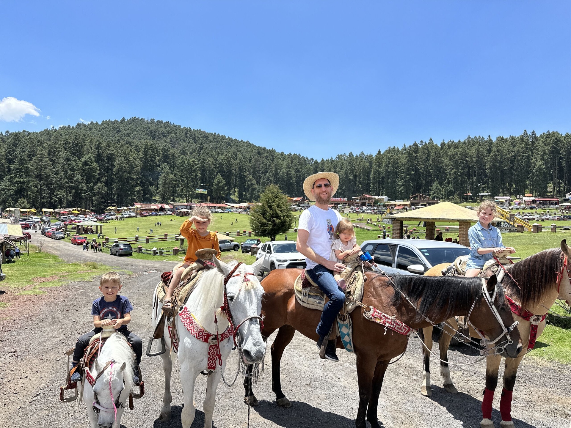 Family on horseback in the mountains
