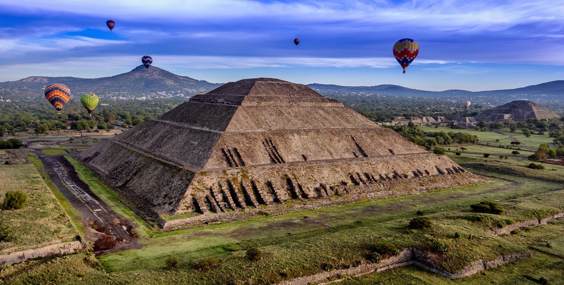 Sunrise hot-air balloon over the pyramids
